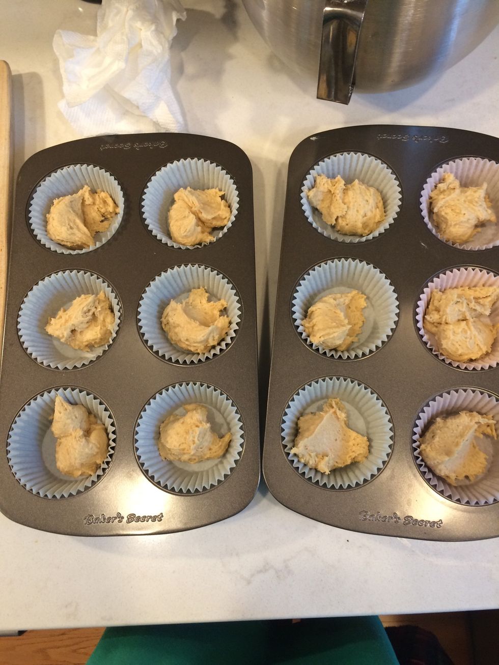 Scoop a small amount of batter into each liner...