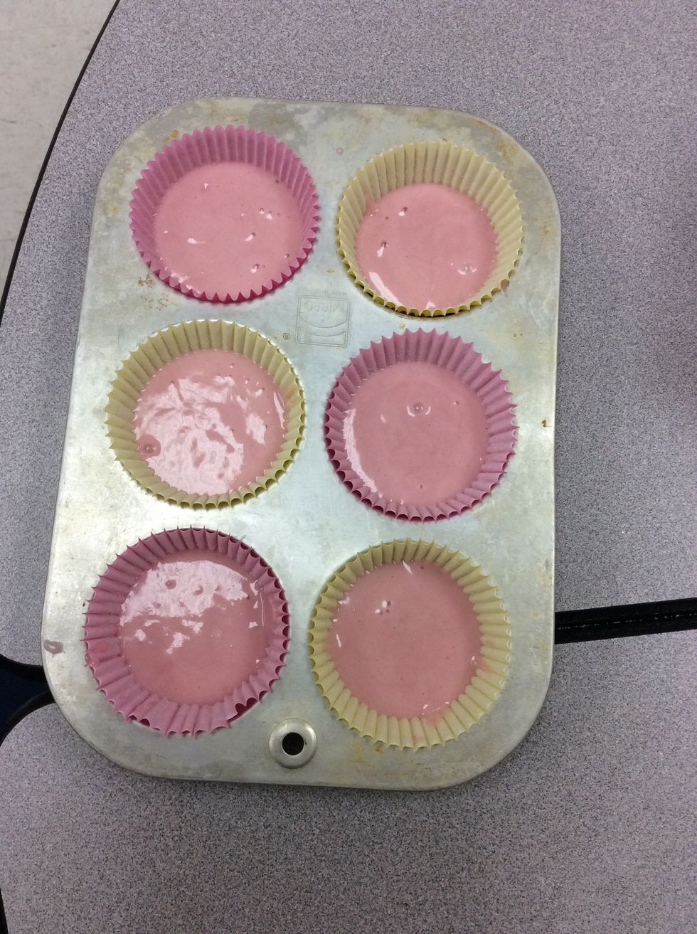 Scoop batter into the cupcake pan.