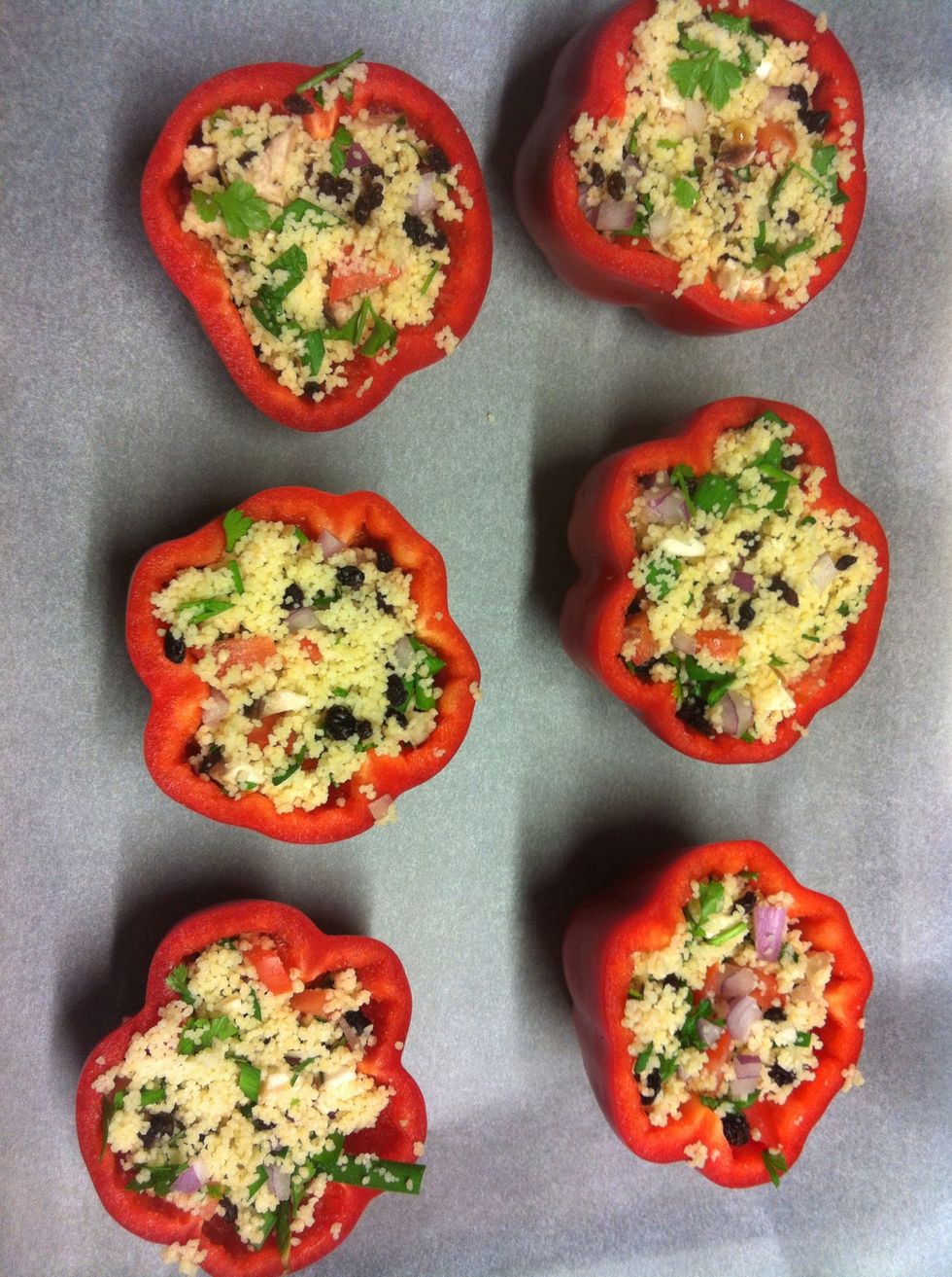 Scoop couscous onto capsicum and place on tray cool for 20-25 minutes