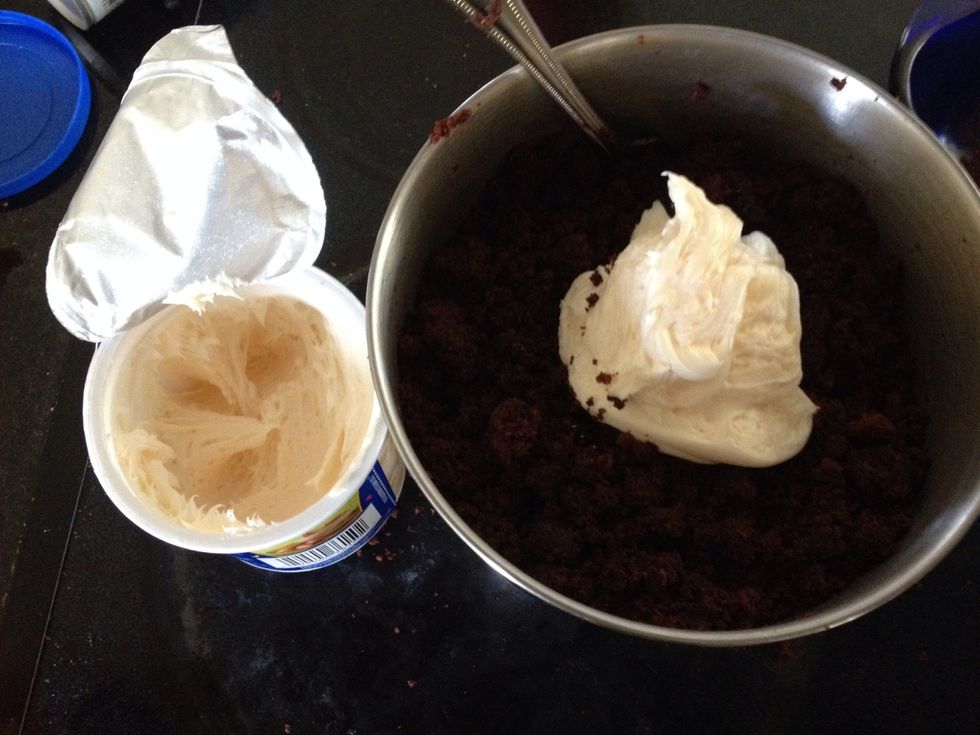 Scoop half of the frosting into the cake crumbs and mix it until the cake is evenly coated with frosting   (IMPORTANT: make sure the cake is cooled down COMPLETELY or else the frosting will melt!!)