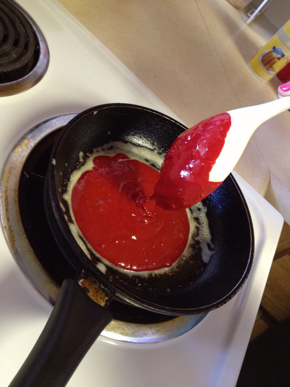 Scoop in about 1/3 cup of batter into the pan.
