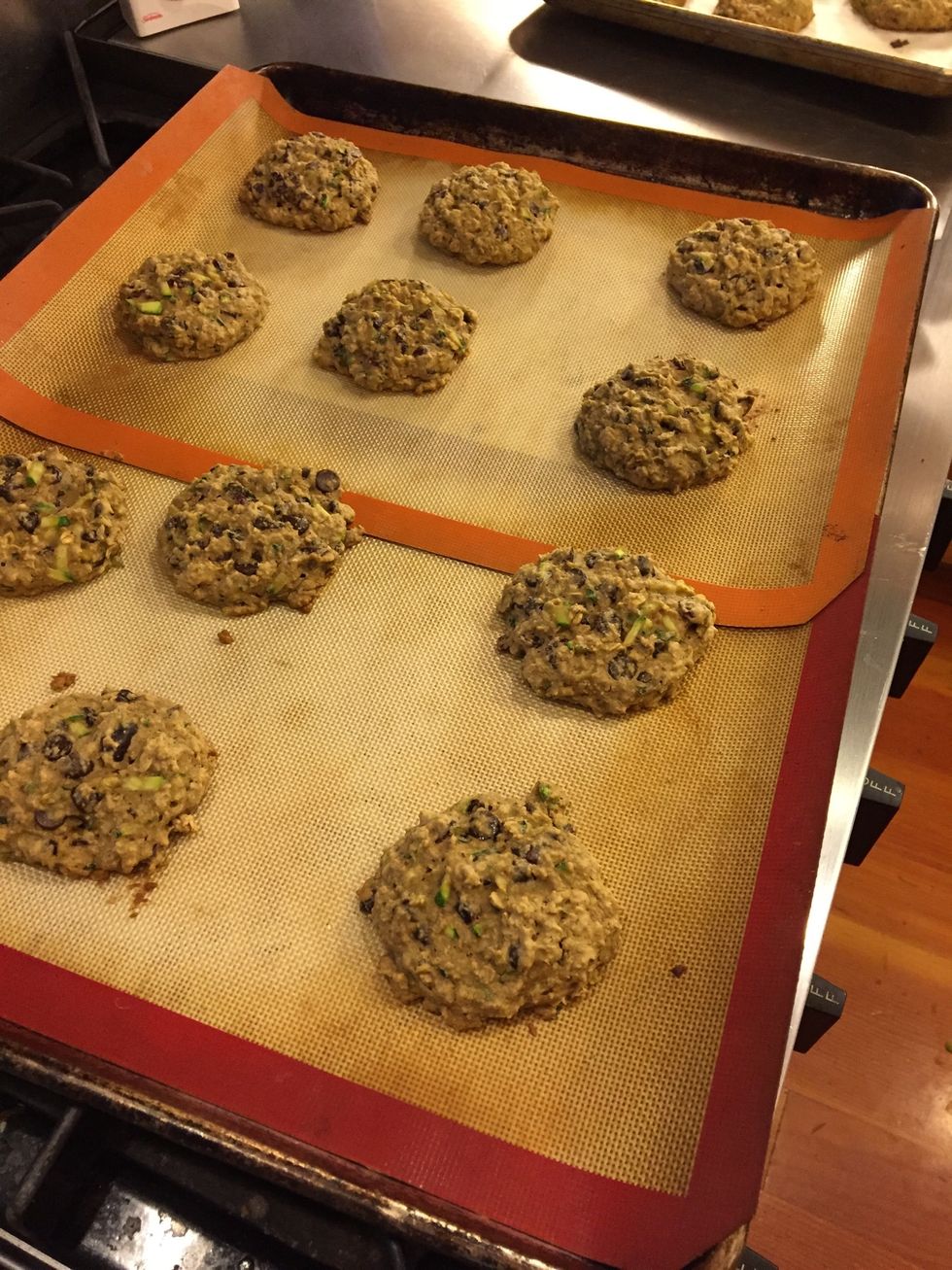Scoop onto a parchment or silipat lined baking sheet. Bake for approximately 10 min at 350 degrees F.