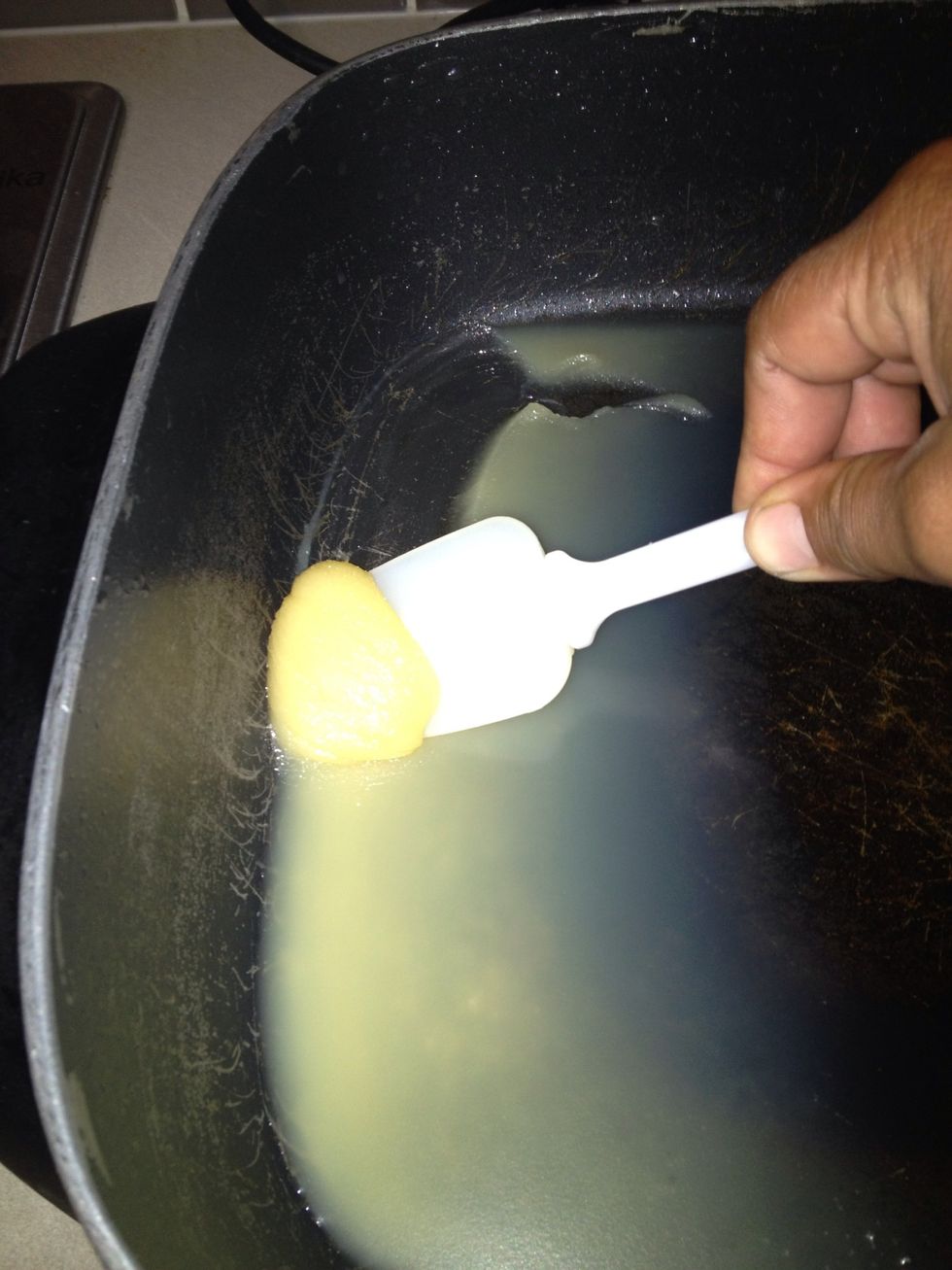 Scoop out fat with spatula