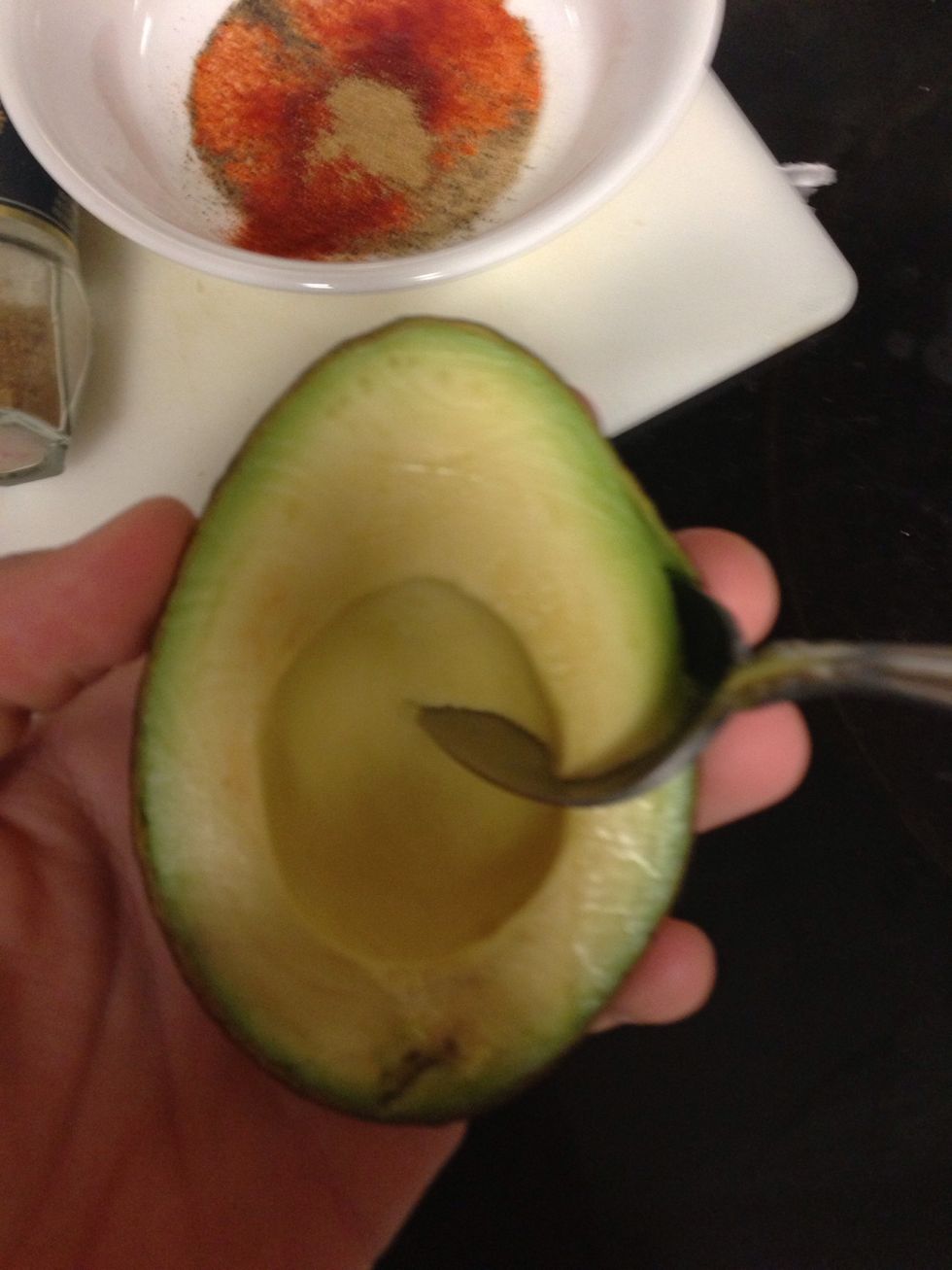 Scoop out the avocado like this