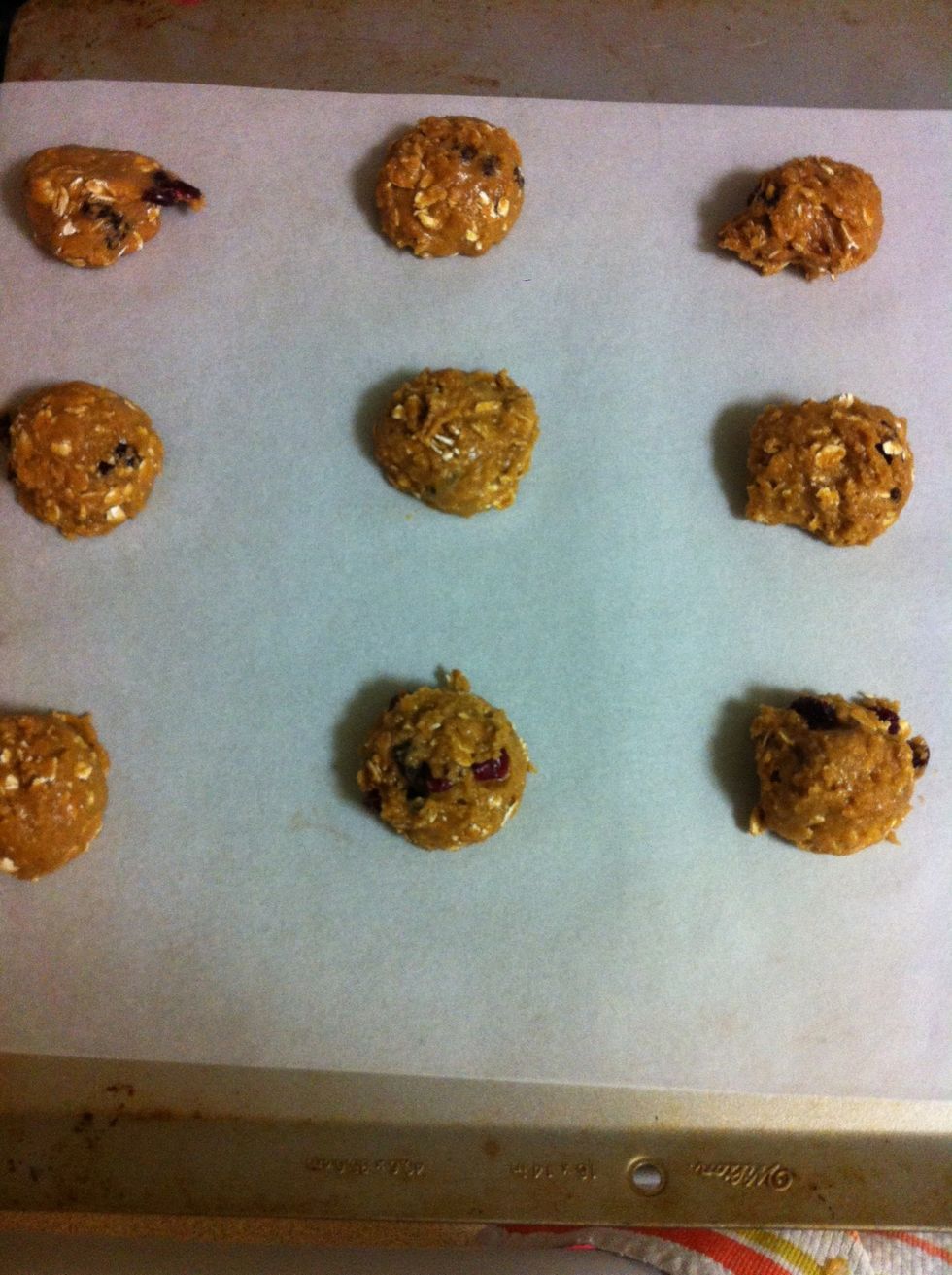 Scoop out the cookies onto a baking sheet