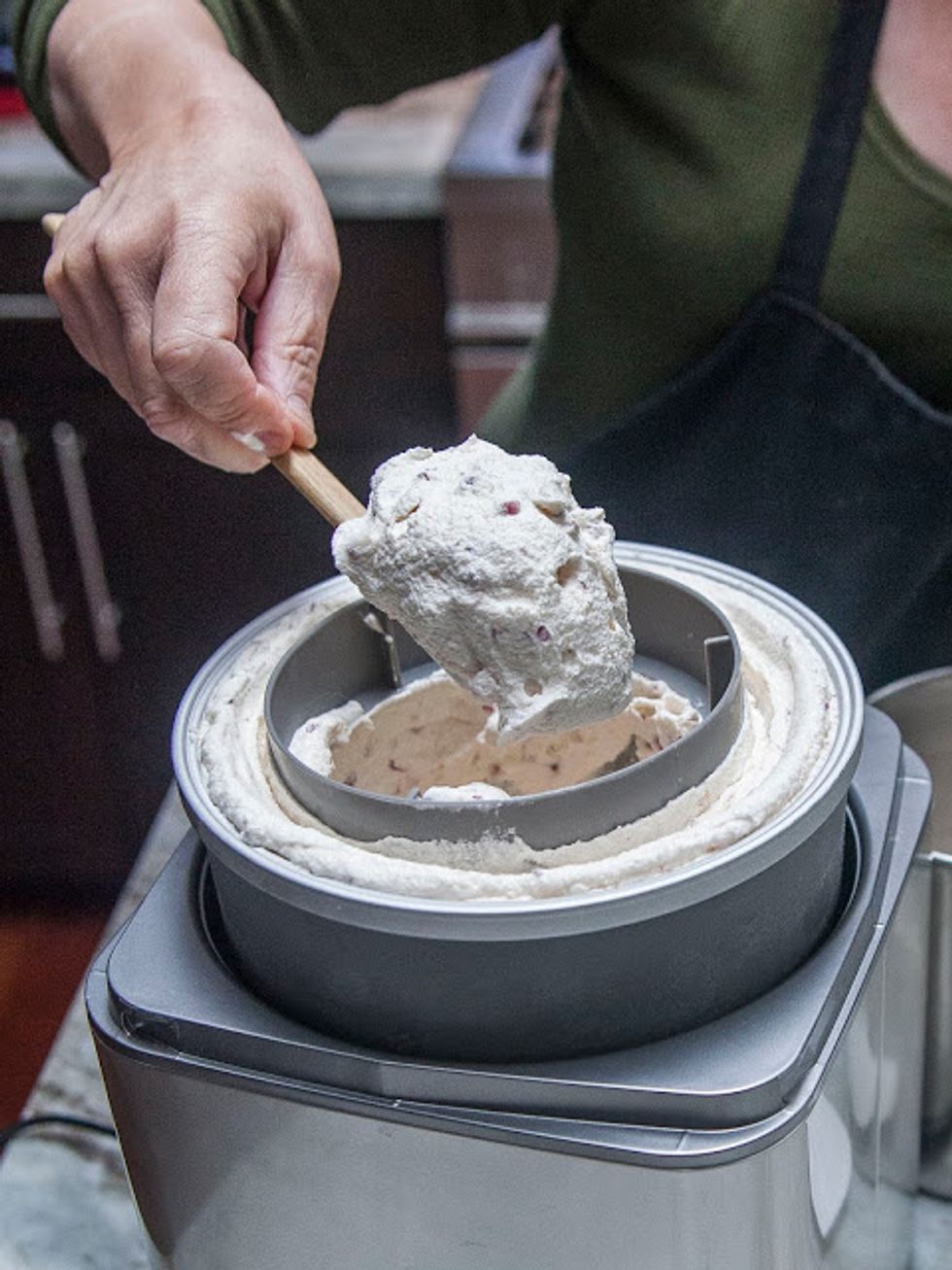 Scoop out the ice cream and put it into a freezer container and into the freezer for an hour or two to firm up.