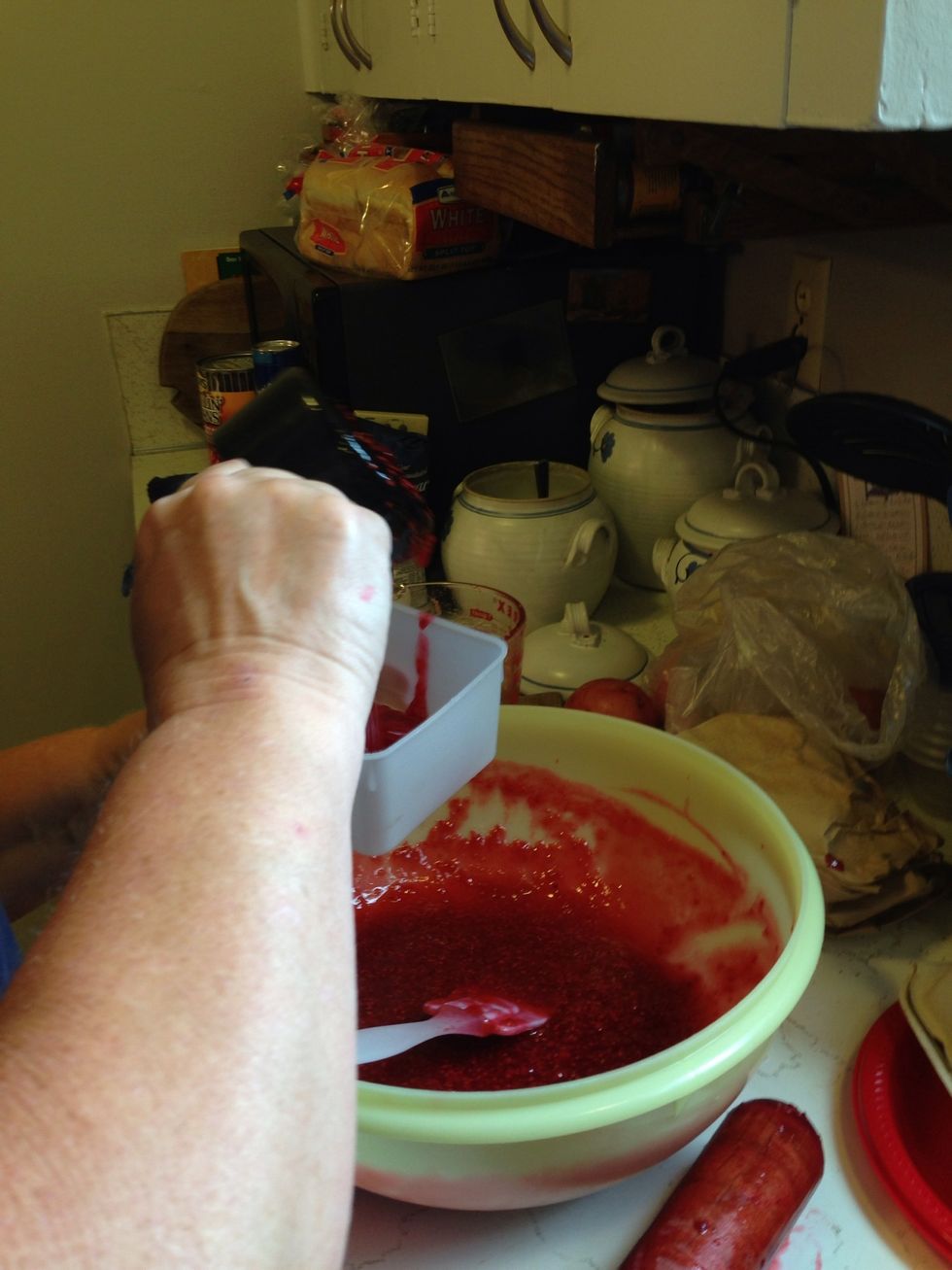 Scoop out the jam into the containers. Be careful not to overfill. The jam should be 1/2 an inch away from the top.
