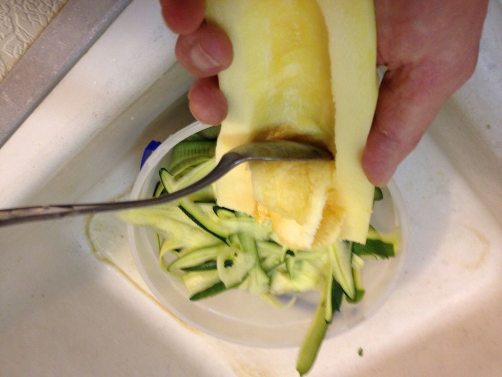 Scoop out the seeds and pith.