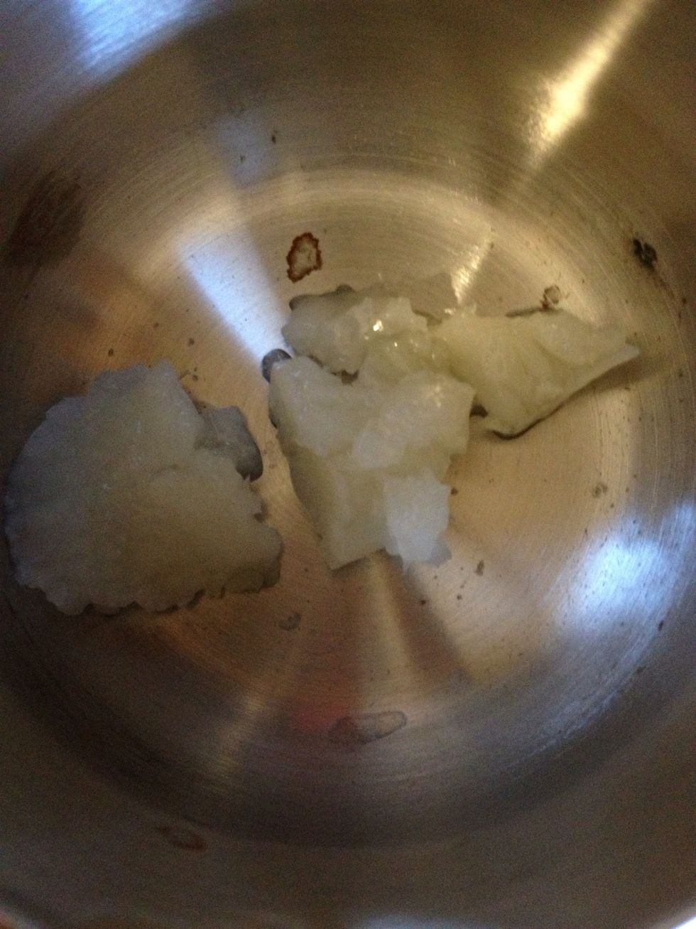 Scoop some coconut oil into the pot
