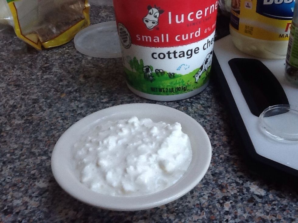 Scoop some cottage cheese in a bowl.