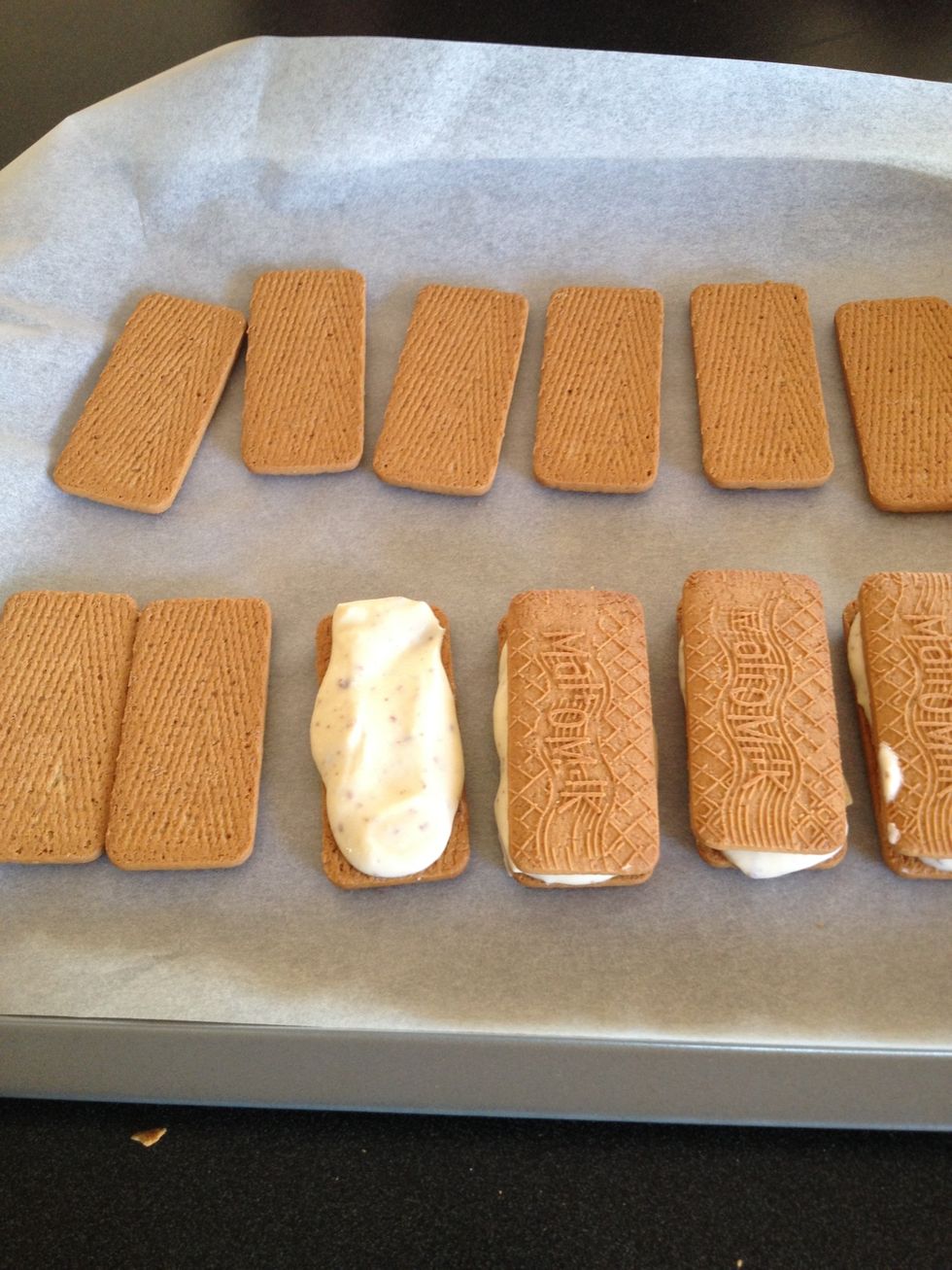 scoop some of the cream mixture out onto the biscuits and place the other half on top.