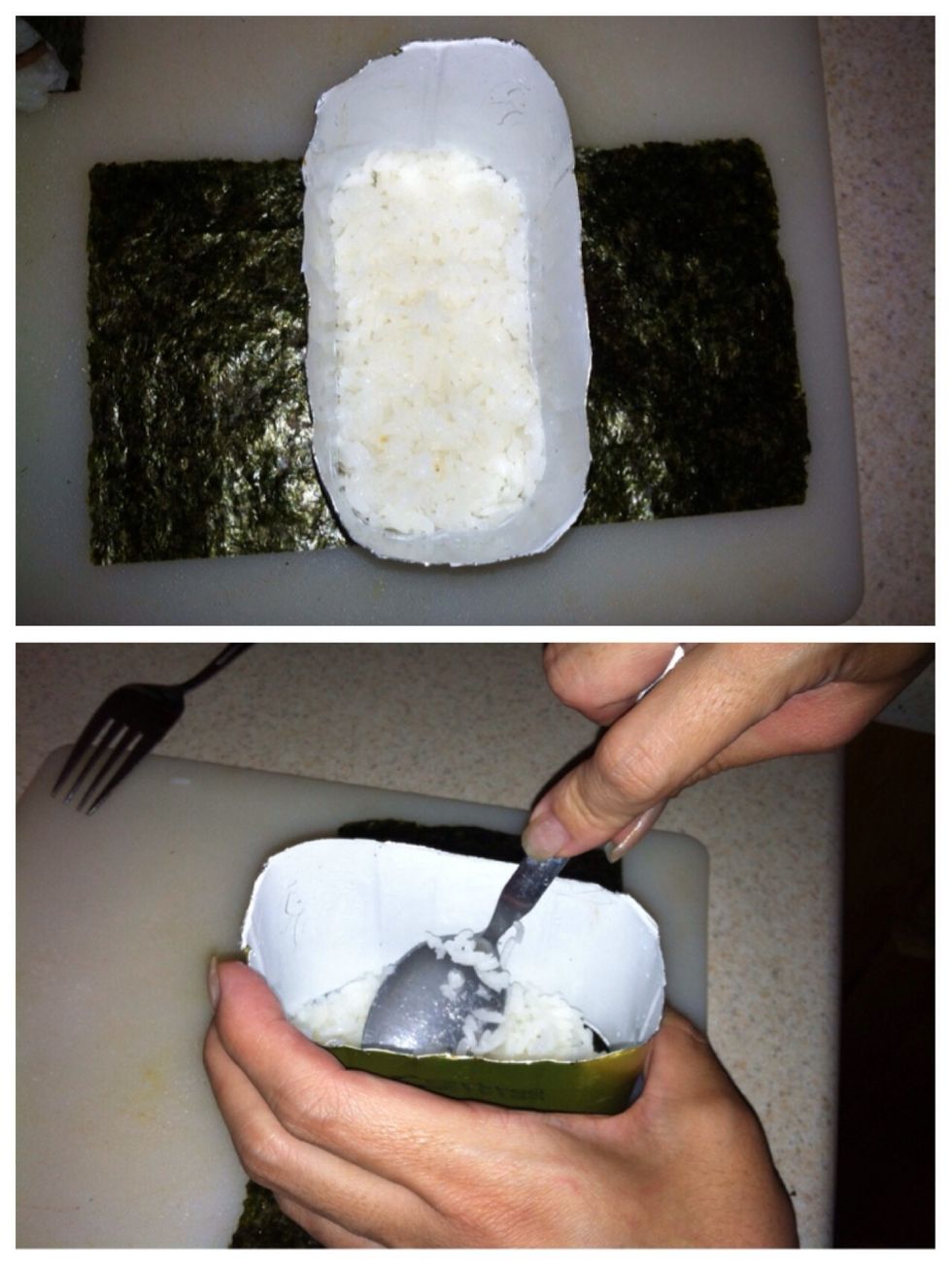 Scoop some rice into the mold & press down on the rice with the musubi-maker (or spoon). Follow with a slice of Spam, then another layer of rice. Give it one final press to keep this baby together.