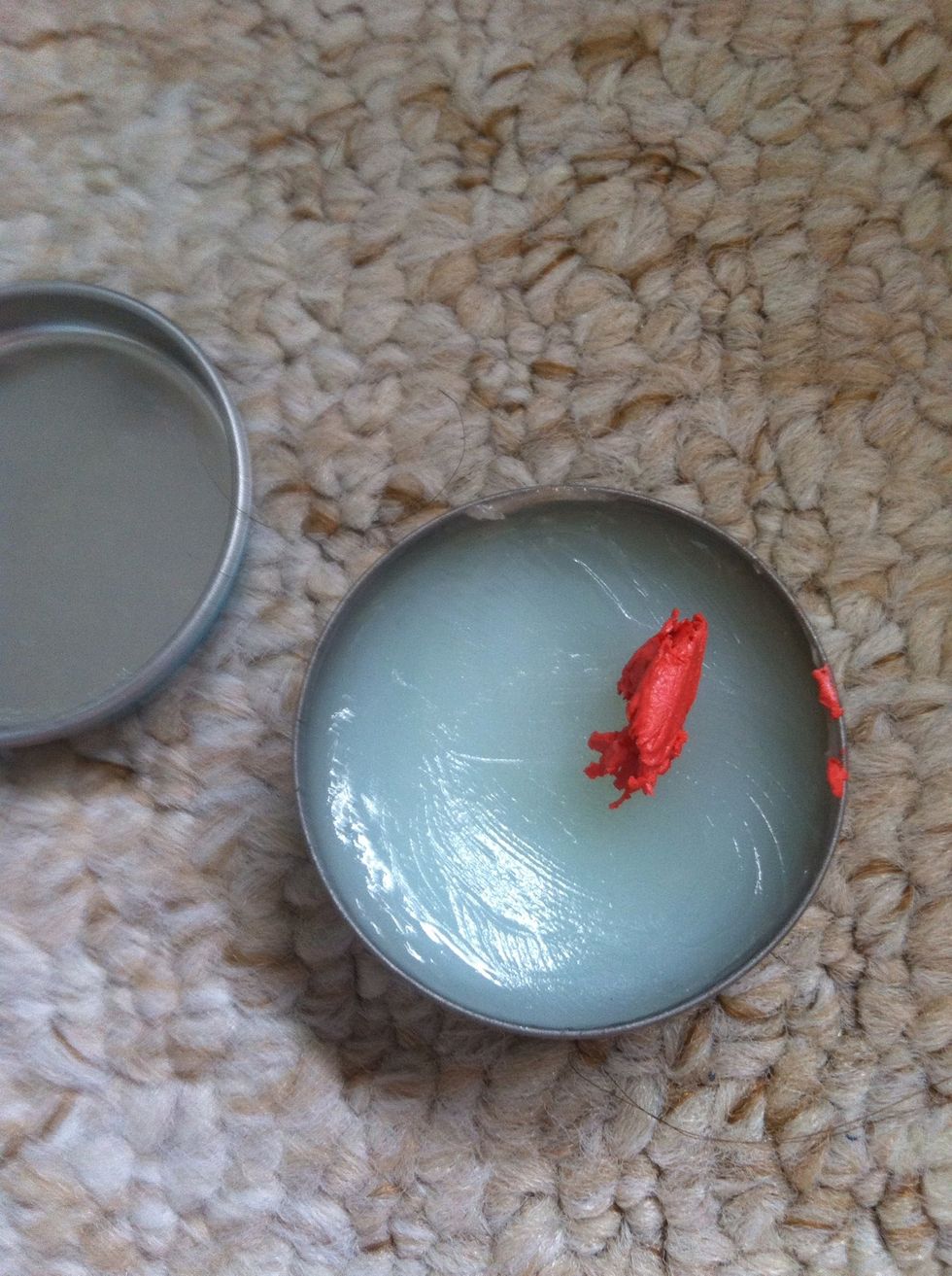 Scoop the lipstick of the tool of your choice just using your finger and place it straight into your lip balm