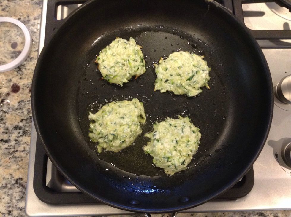 Scoop the mix into tablespoon size rounds and place in pan. Press down to flatten out
