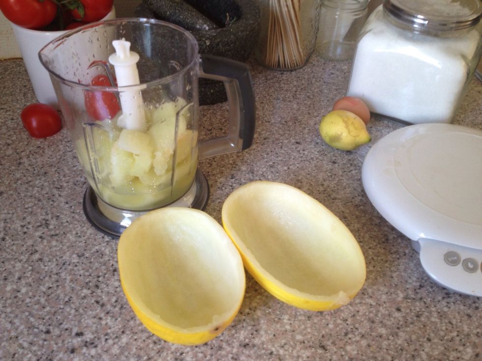 Scoop the seeds out and put the melon flesh in your blender together with the sugar and the juice of a lemon or 3 tablespoons of lemon juice Save the skins to freeze sorbet in.