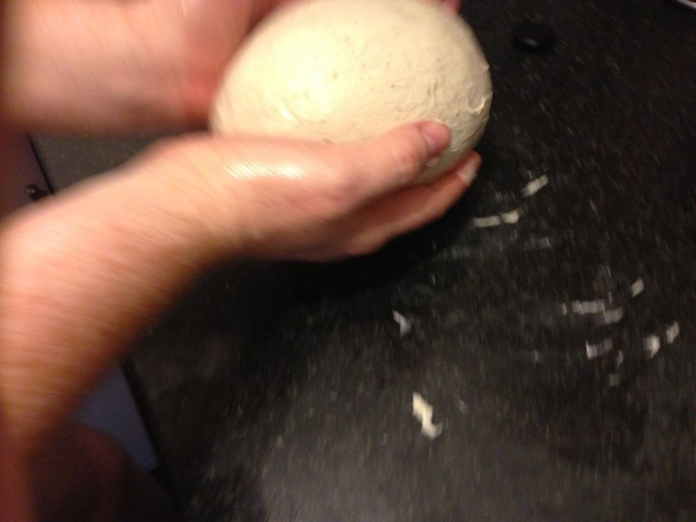 Scoop up the dough and return it to the oiled bowl.