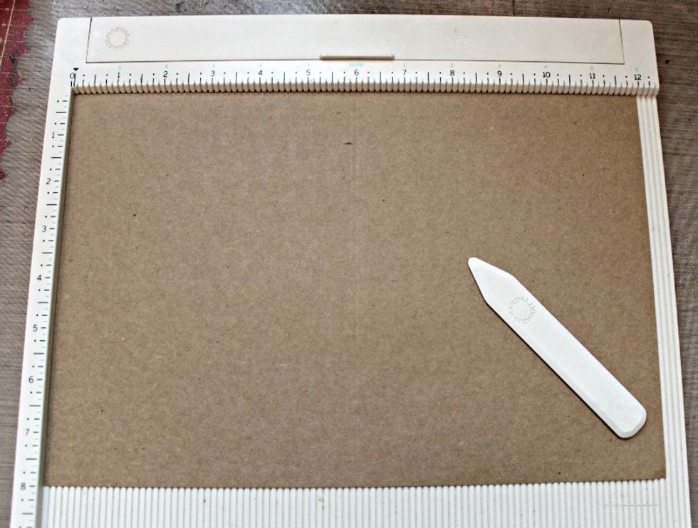 Score 12" x 8" Kraft Card Stock to create a 6" x 8" card base.
