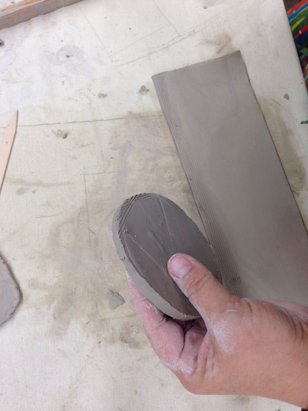 Score all edges and add slip or water.