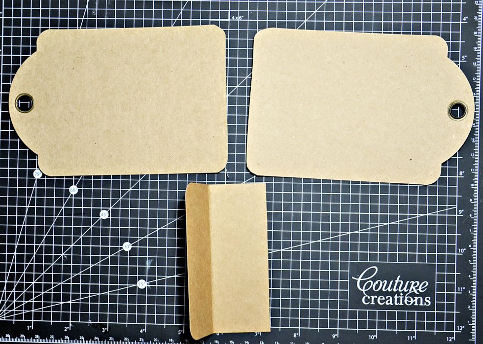 Score and fold in half both offcuts as shown.