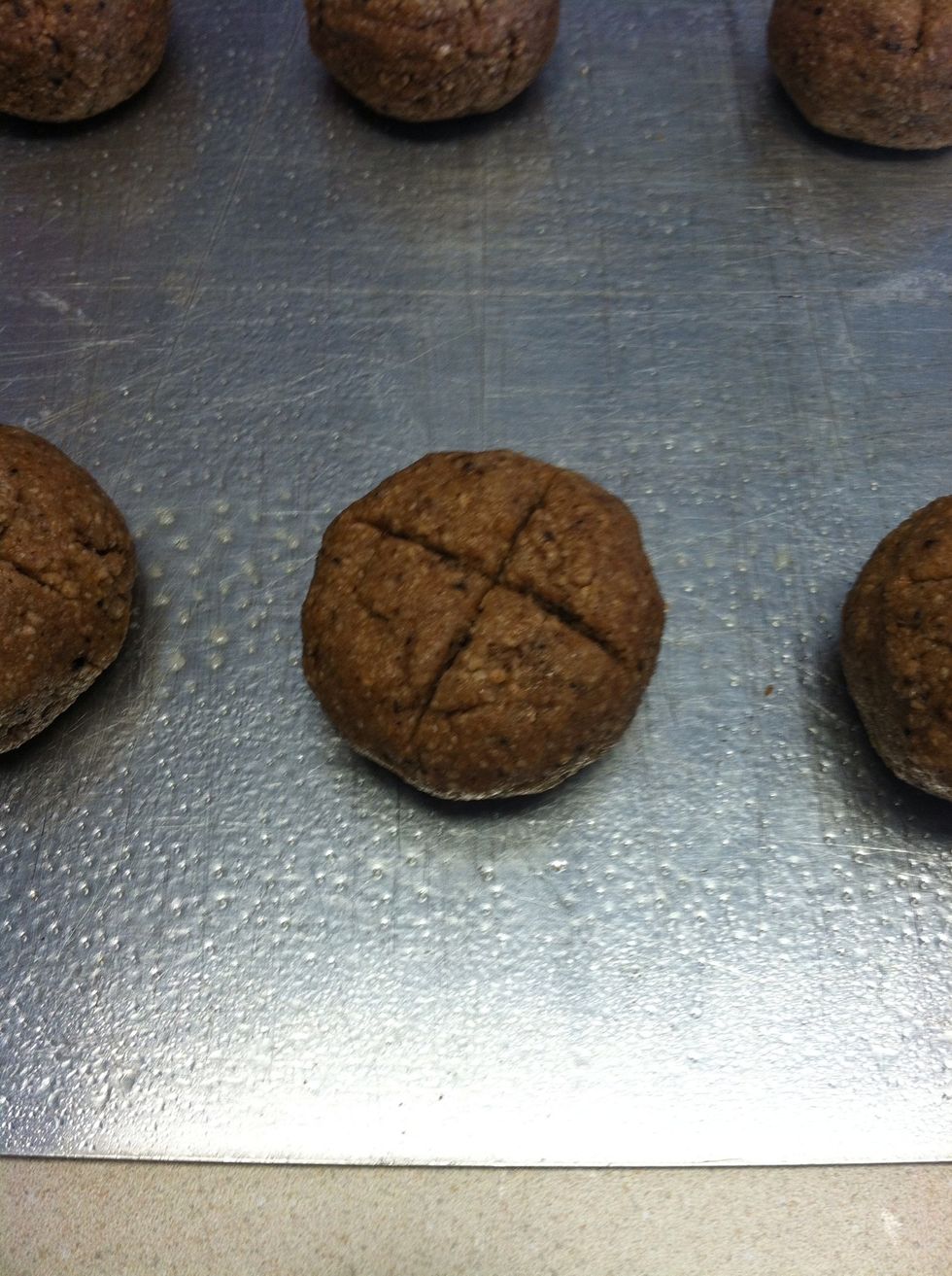 Score each ball to make it look more like bread. Bake for 50 minutes
