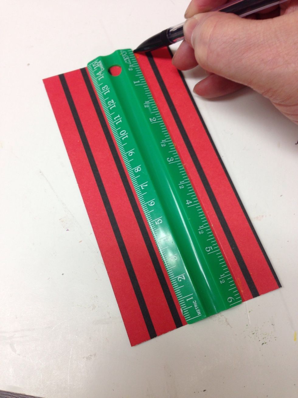 Score one of the 3 inch strips 3/4 inch from the right edge. Score the second 3 inch strip 1 1/4 inches from the right edge.