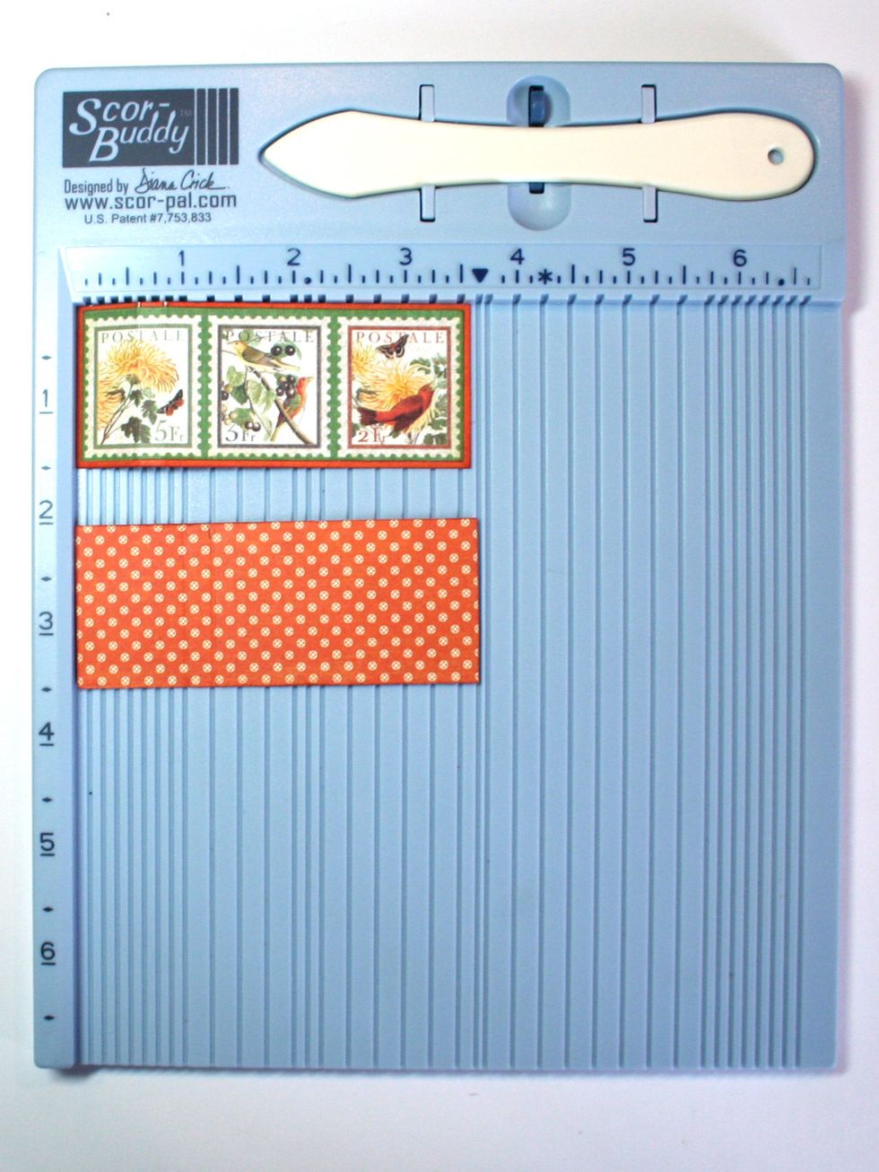 Score one of the stamp strips at 5/8" and 7/8". This will be the left side strip. Turn the other strip over and score at 1" and 1.25".