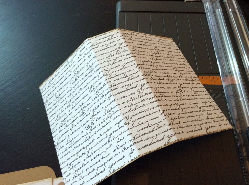 Score paper 2.5" from each end, creating a 1" spine in the center.