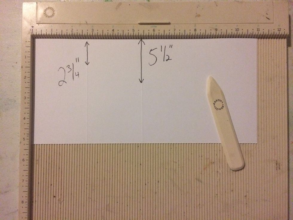 Score the 5 1/2" x 11" cardstock at the 2 3/4" mark and the 5 1/2" mark.