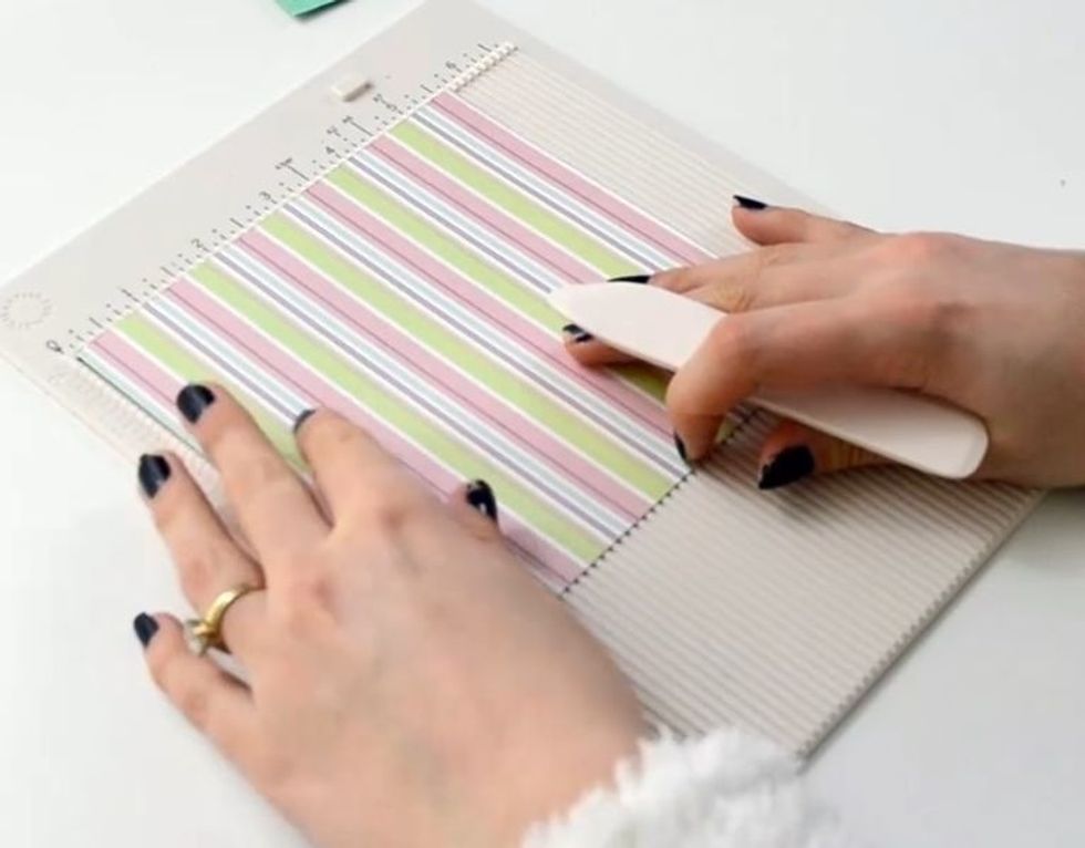 Score the designed paper.