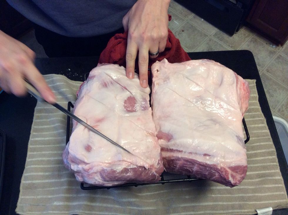 Score the fat on the butt with a sharp knife. This allows the rub and smoke to penetrate this layer. Helping it cook all the way through.