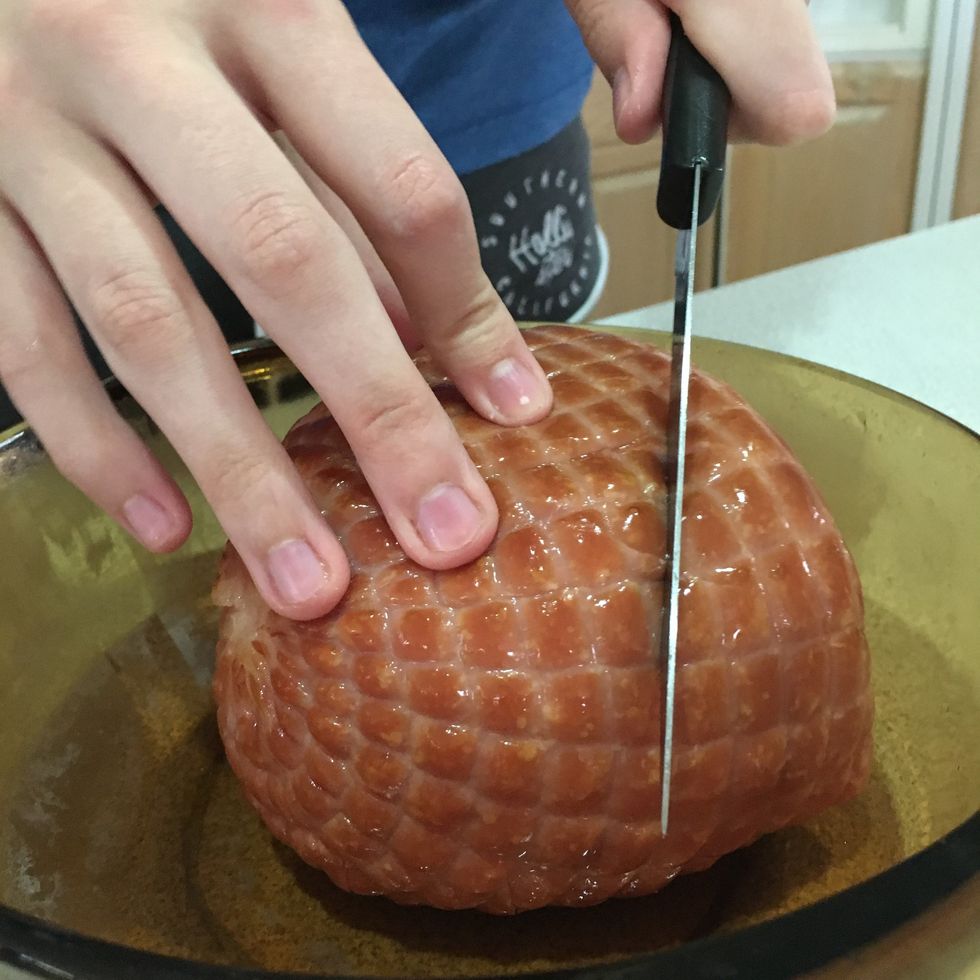 Score the ham on both sides