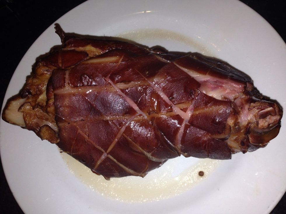 Score the skin with a sharp knife be sure not to cut in to the meat