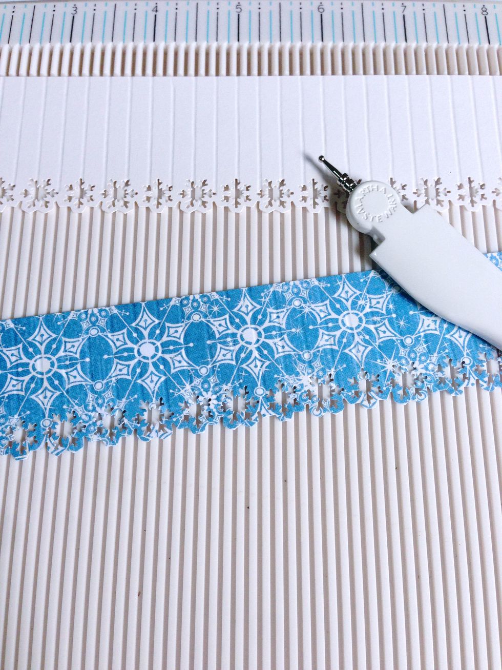 Score them at 0.25" intervals as shown throughout the entire 12" strips...