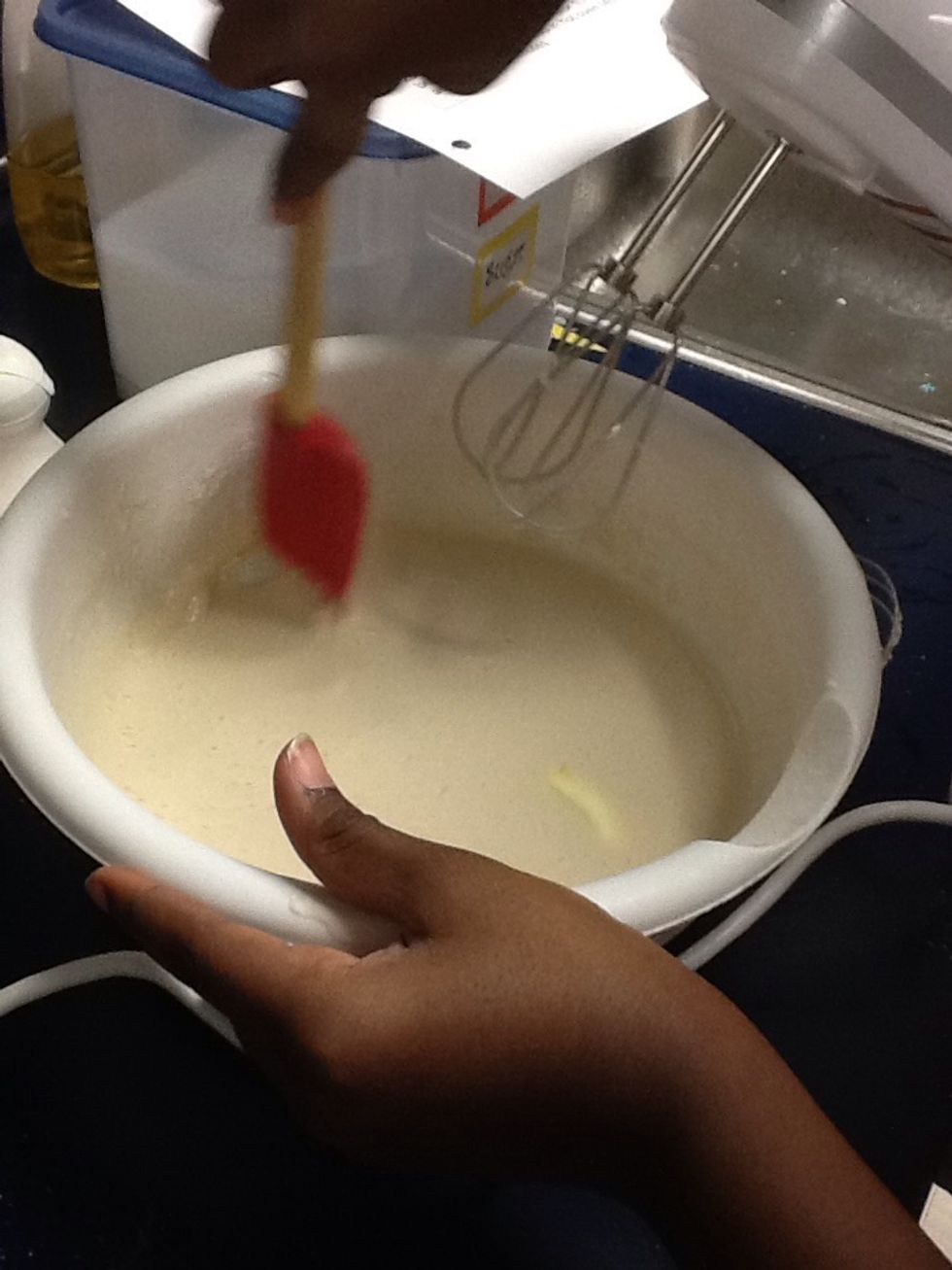 Scrap sides of the bowl with spatula.