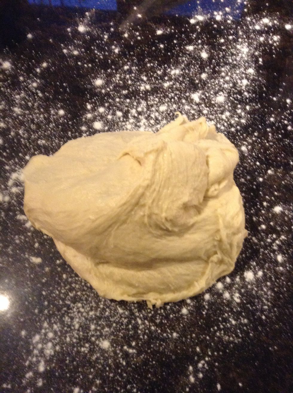 Scrape and pour dough on to lightly floured work surface using your floured hands knead dough an additional minute or so until smooth , do not add additional flour! Dough should be very soft.