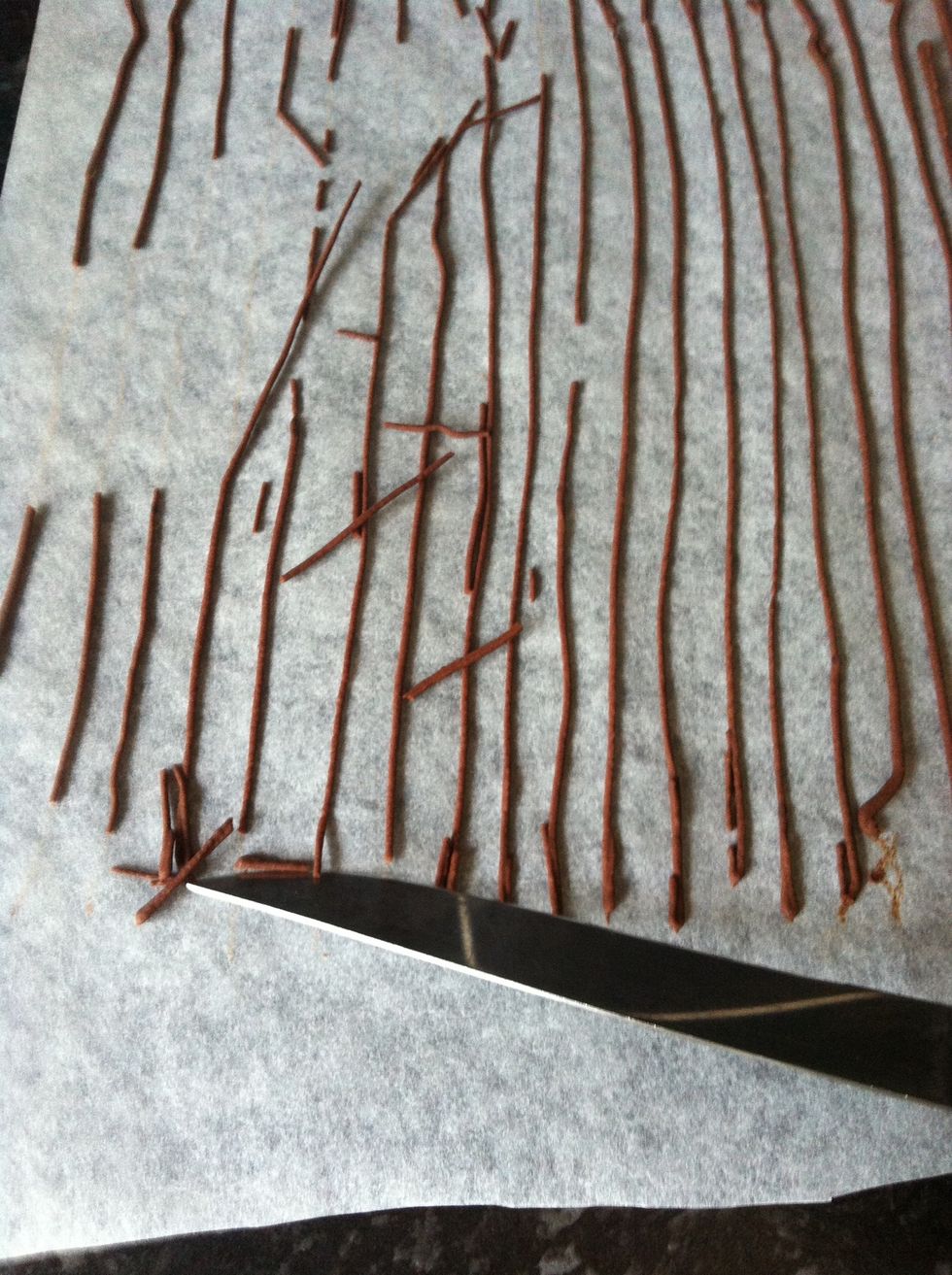 Scrape at an angle with a knife..cut strips that are too long