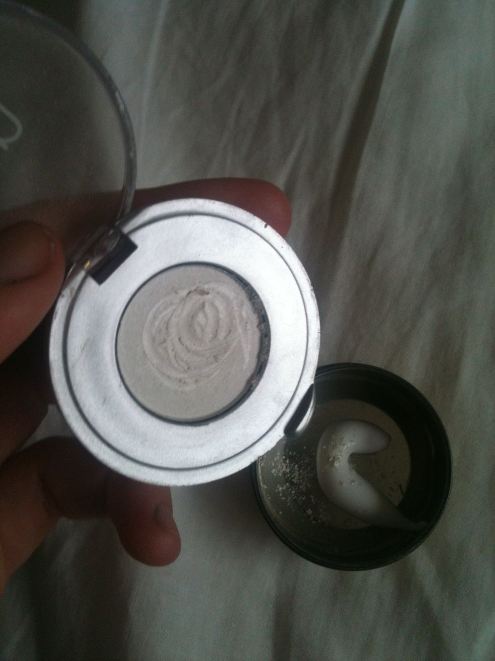Scrape off some of the eyeshadow using the back of your mixing tool