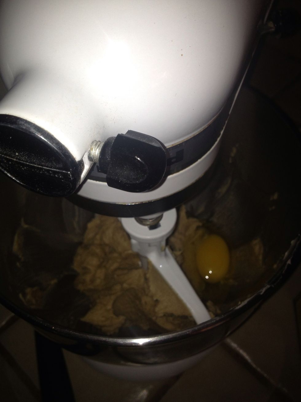 Scrape sides of bowl, then add eggs one at a time.