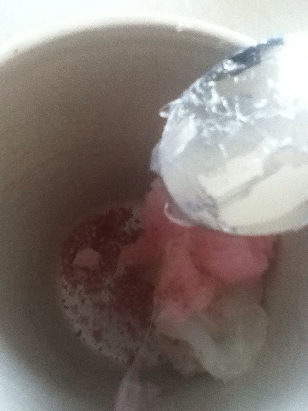 Scrape some eye shadow with the back of the spoon for colour