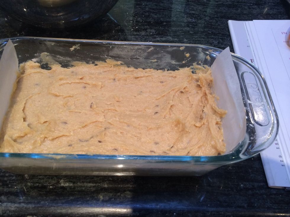 Scrape the batter into the prepared pan. Use a spatula to even out the surface.
