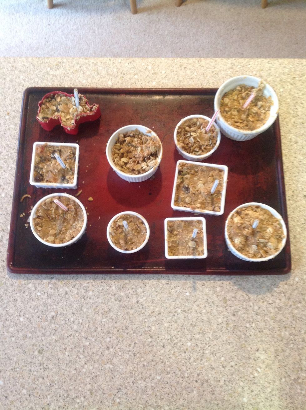 Scrape the crumbs and left over bits into a dish, I've left this one without a straw as I'm going to put it on the bird table rather than hang it up.