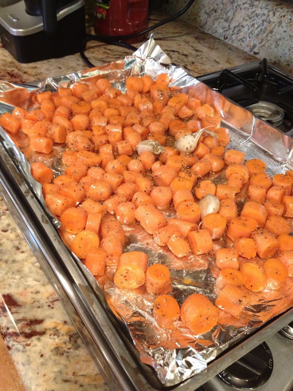 Scrape the dressed carrots into the roasting pan. Spread into an even layer. Roast turning once until carrots are tender and edges get a nice char.