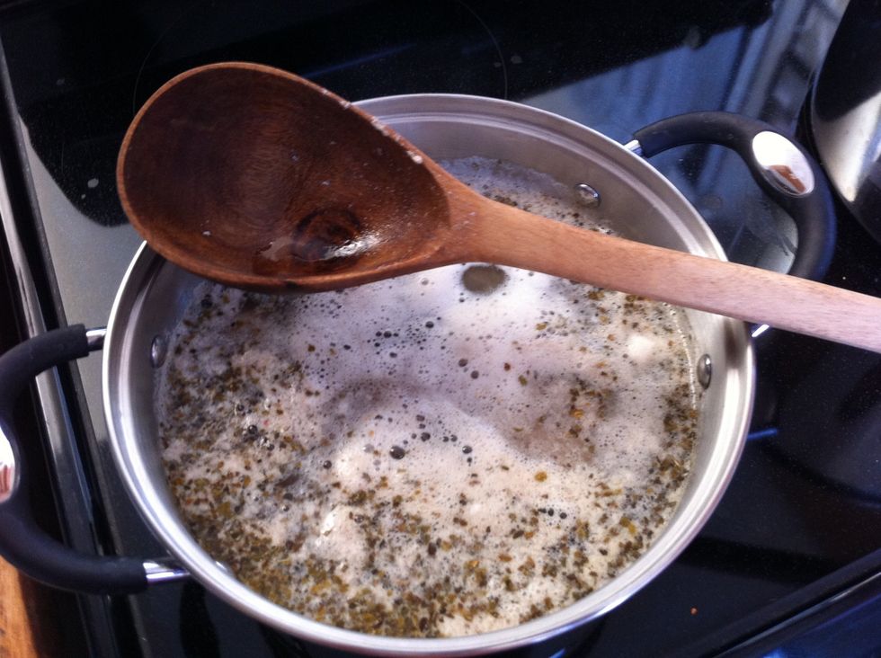 Scrape the "sludge" off, reduce heat to simmer, and add oregano. Should start smelling really good already. Continue cooking the pork at least 90 min. It should fall off the bone with no problem