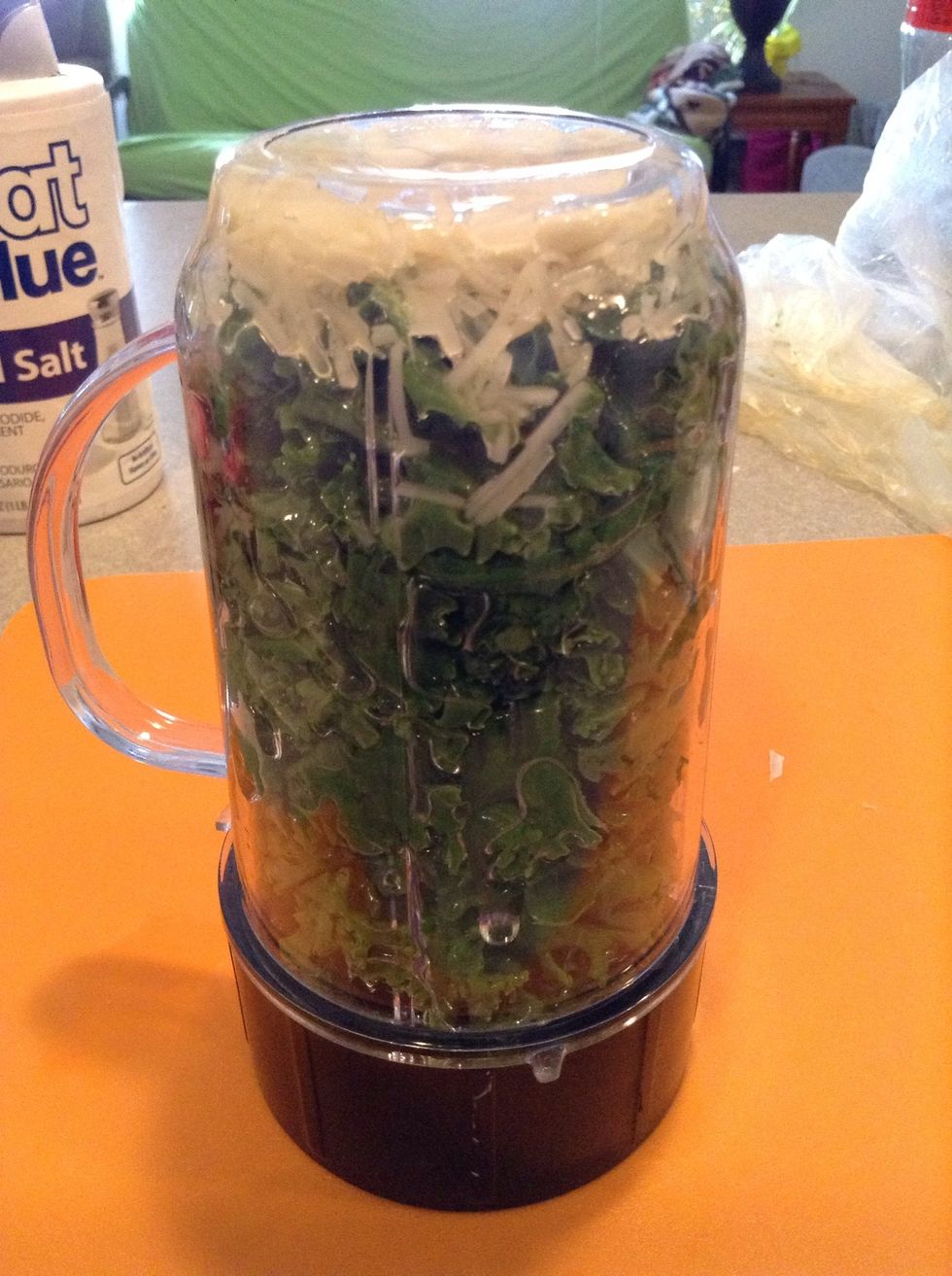 Screw cap on and let oil drop to the bottom.