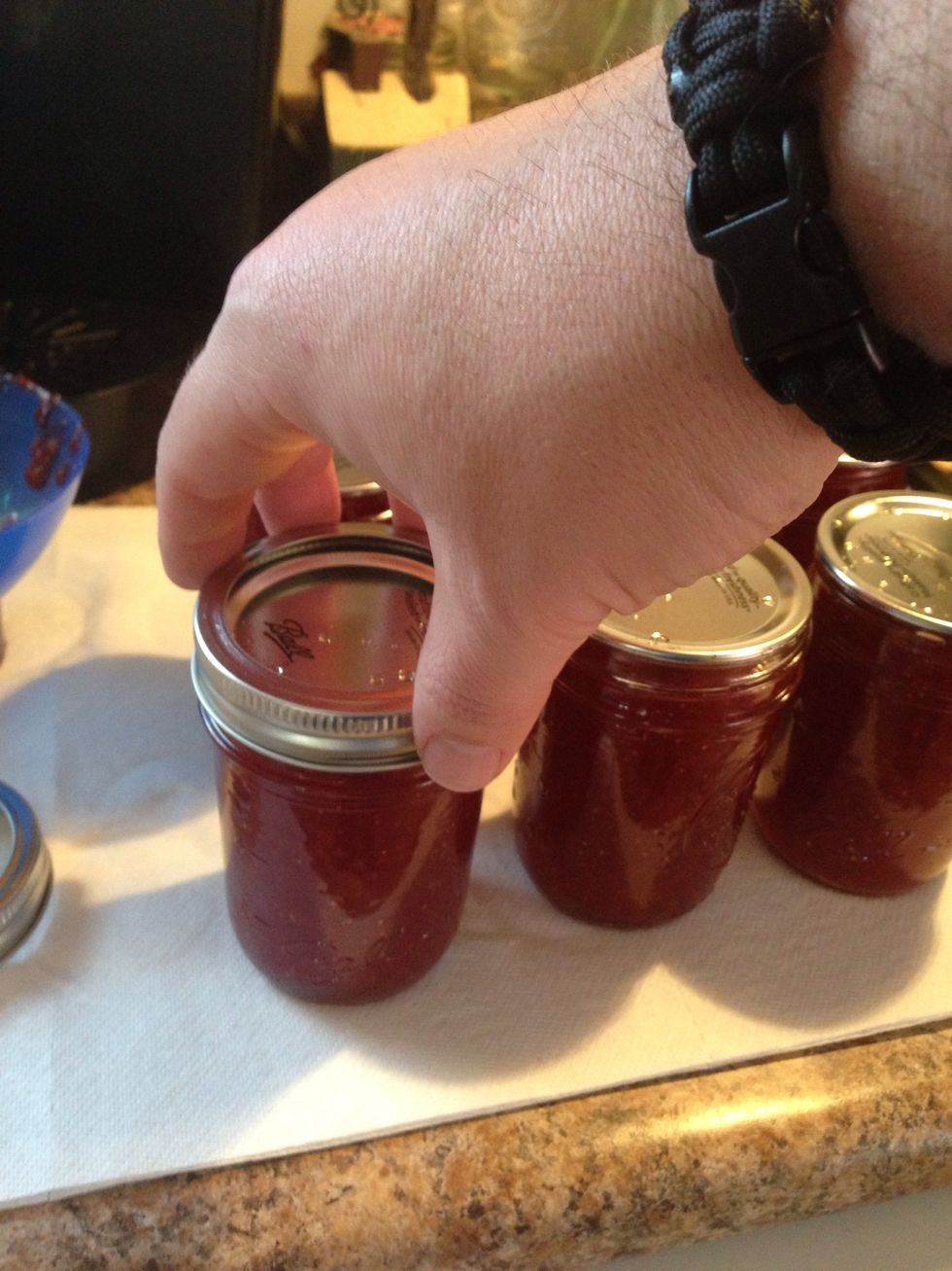 Screw down the rings "finger right" again careful you don't burn your fingers it's still HOT. Tighten but don't over-tighten the rings.