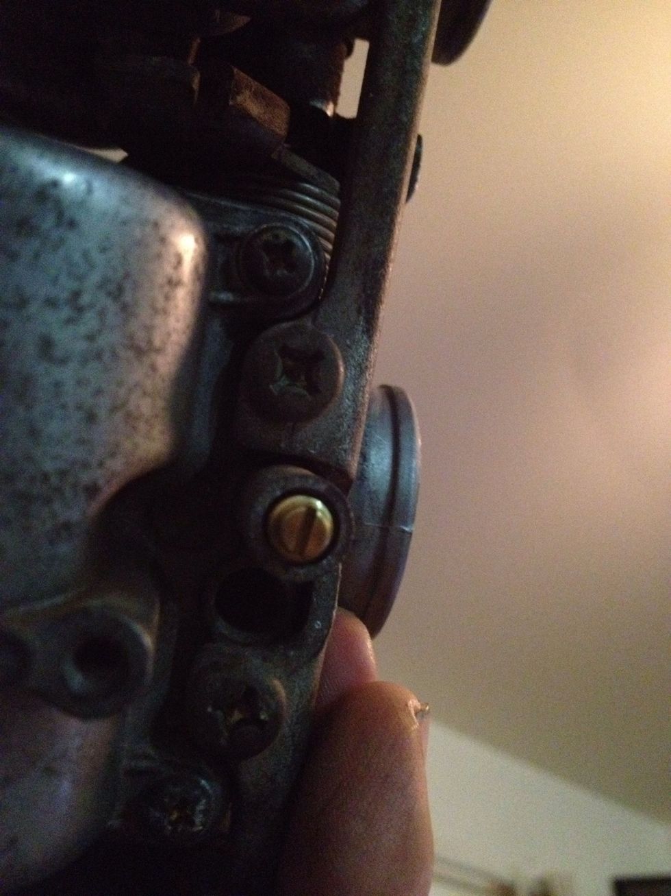 Screw it all the way down then back it off the amount of turns you found before removing the old one and line it up with the grooves you marked.