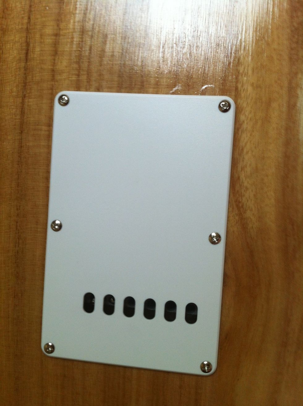 screw the plastic cover over the springs