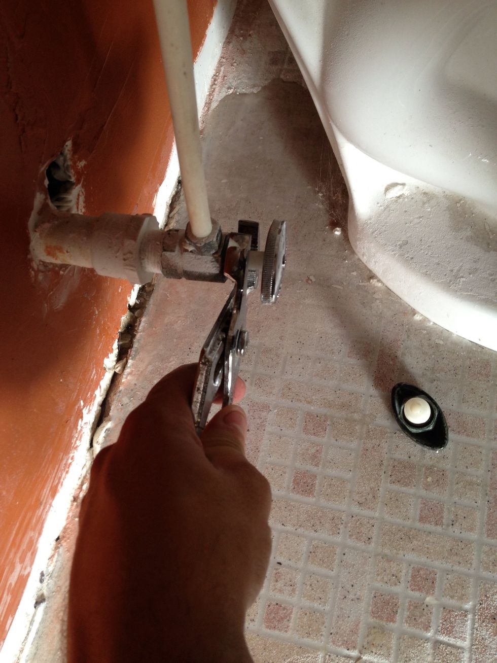 Screw the plunger in all the way and then tighten the metal collar with the wrench. Don't over tighten it though. You'll feel when it's tight enough... That's what she said... Sorry.