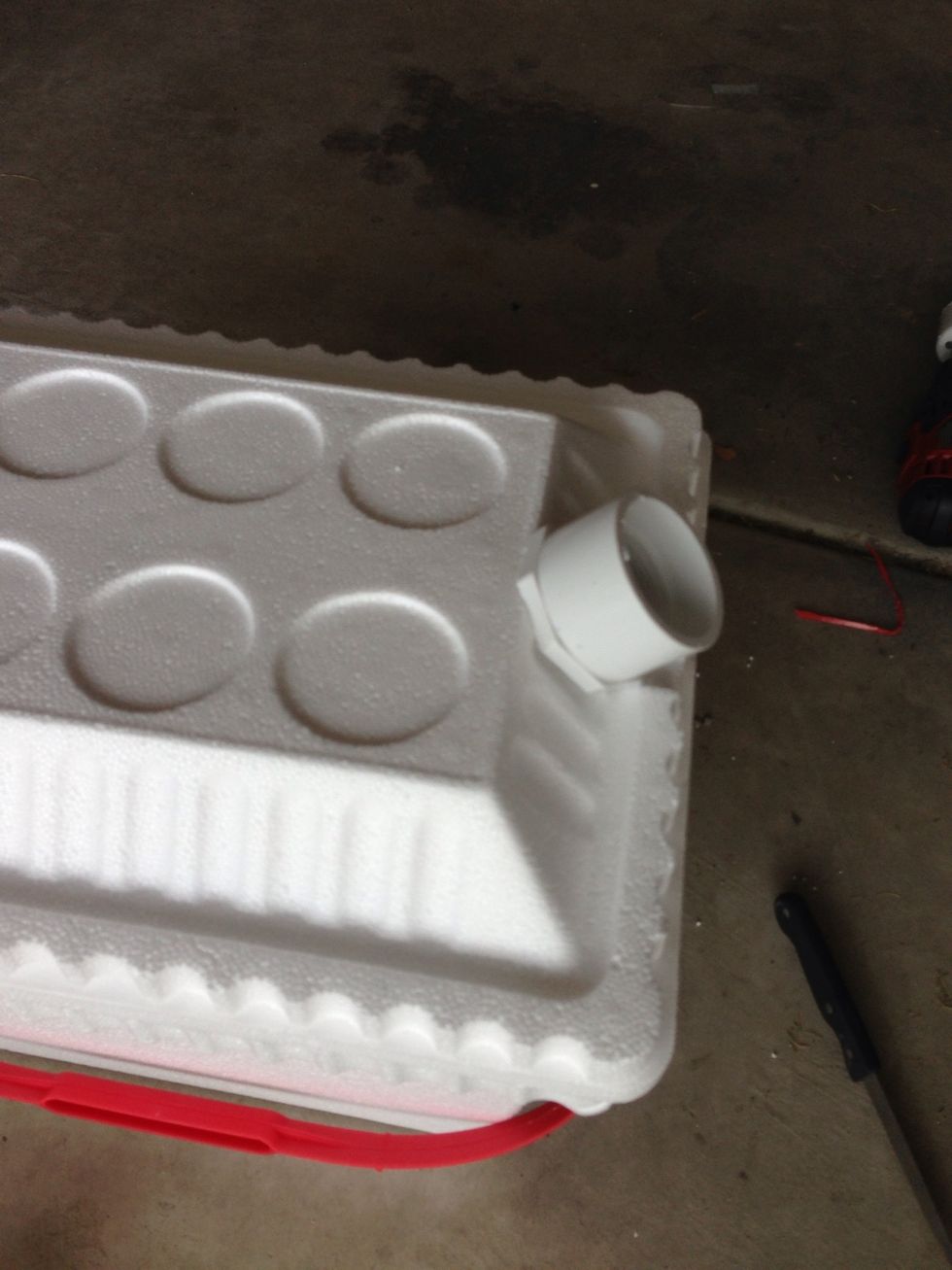 Screw the PVC pipe fitting so half is inside the other is outside