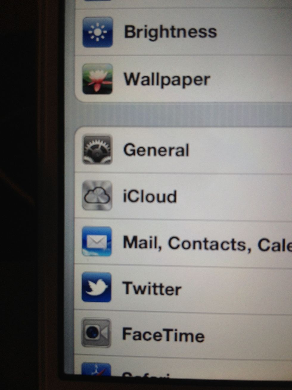 Scroll down and select iCloud